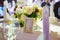 table with sign for number or names of guests in banquet hall of restaurant.