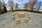 The Table Of Silence. It is a stone sculpture made by Constantin Brancusi.