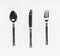 Table silverware cutlery setting with fork,knife and spoon on white background