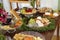 Table with snacks - party buffet with various savory foods