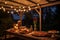 table spread with homemade pies under a string light-lit gazebo