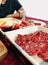 Table Spread of Pepperoni, Fruit, Cheese Plate for Holiday Dinner