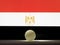 The table tennis ball stands on a surface in front of Egypt flag.