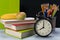 Table with textbooks, pencils and school lunch, close-up