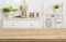 Table top with blurred kitchen furniture as background