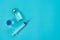 Table top view accessories healthcare & medical with coronavirus background concept.Anti retroviral vaccine bottle with Syringe on