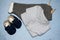 Table top view decoration baby shoes and clothes, body sut and pants. Flat lay