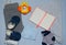 Table top view decoration baby shoes clothes notebook and toys. Flat lay
