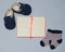 Table top view decoration baby shoes clothes notebook and toys. Flat lay,