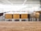 Table Top wooden Counter blur meeting room Office building interior background