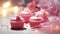 A table topped with pink cupcakes covered in frosting