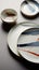 A table topped with plates and bowls on top of a table