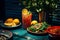 a table topped with plates of food and a glass of lemonade