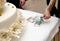 Table with wedding ring and money on it