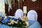 The table of young.Composition of hydrangeas, white tablecloth. White-blue gamma