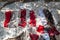 Tablecloth handcrafted, lying on ground to display variety of products. Lindos Town. Greek Island of Rhodes. Europe