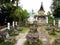 Tables and chairs carved in stone in a Catholic cemetery on Lake Toba, Pulau Samosir. Indonesia