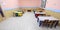 Tables and chairs in the dining room of the nursery canteen