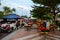 Tables chairs and hawker vendors at outdoor Laboo Food Street Ipoh Malaysia