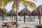 Tables and umbrellas in Carlisle Bay beach, Bridgetown, Barbados.