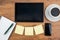 Tablet, Adhesive Note, notebook and smart phone with coffee