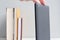 Tablet on blurred background of books