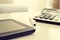 Tablet and calculator on an office desk