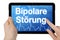 Tablet computer with the the german word for bipolar disorder - bipolare Strung