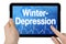 Tablet computer with the german word for winter depression - Winterdepression