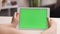 Tablet Computer with Green Screen and Chroma Key for Copy Space. Chromakey Mock Up with Modern Device. Business Woman