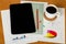 Tablet, Cup of coffee, pencil, buttons, sheets of paper account