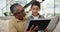 Tablet, education or game with grandfather and boy on sofa in living room of home together for visit. Family, technology