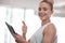 Tablet, fitness woman portrait and thumbs up of a happy female in a gym with training exercise app. Yes, agreement and