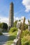 Tablet in the Glendalough Cemetery and The Round Tower