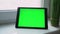Tablet with green screen display, chroma key. Electronic device gadget laptop