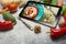 Tablet With healthy recipes blog on screen. web with nutritious