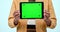Tablet mockup, green screen display and hands in studio with website, internet and social network. Ux, ui and closeup of