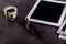 Tablet notepad, glasses and espresso coffee cup in the office