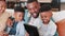 Tablet, search and happy black family on a sofa for streaming, cartoon or video in their home together. Digital, app and