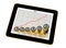 Tablet showing increasing profit chart, with golden Bitcoins on it