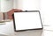 Tablet with white space to insert customization held by man in white coat. Doctor or manager shows data to the patient. Business d