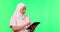 Tablet, woman nurse and green screen isolated on studio background for healthcare typing or doctor online application