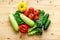 A tabletop arrangement of fresh vegetables multicolored, top view