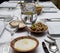 Tableware, glass tumblers, cutlery, bread