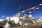 Tabuche with buddhism flag from nepal in everest himalaya trek