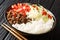 Taco rice takoraisu is a popular example of Okinawan cuisine it consists of taco flavored ground beef served on a bed of rice