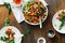 Taco salad on wooden table top view Dinner table