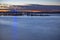 Tacoma docks at sunset with American flag