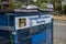 Tacoma, WA USA - circa August 2021: Angled view of a corrugated cardboard recycling bin in the Old Town Tacoma area