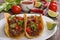 Tacos stuffed with ground beef and chili